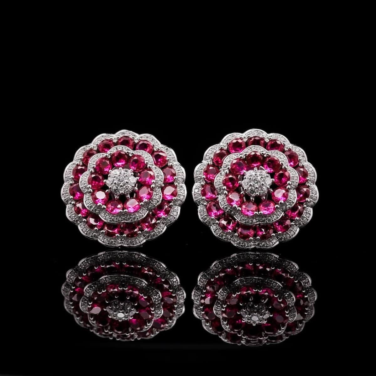 Omnia Floral Halo Earrings with Ruby Red Simulated Diamonds in 92.5 Silver - OMNIASTORES UAE