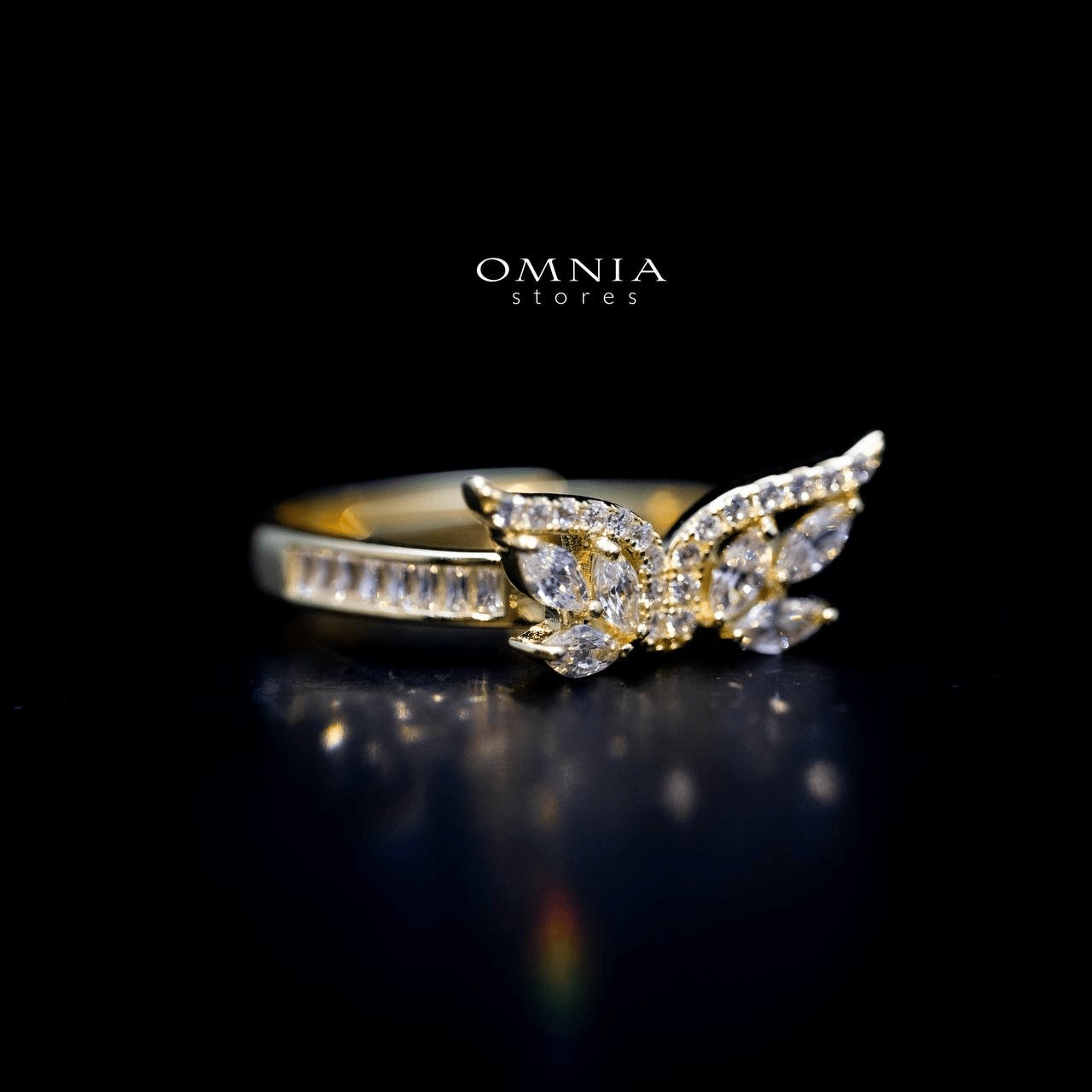 Omnia Malak Winged Charm Ring with High Quality Iced Cut Stone in 92.5 Silver - OMNIASTORES UAE