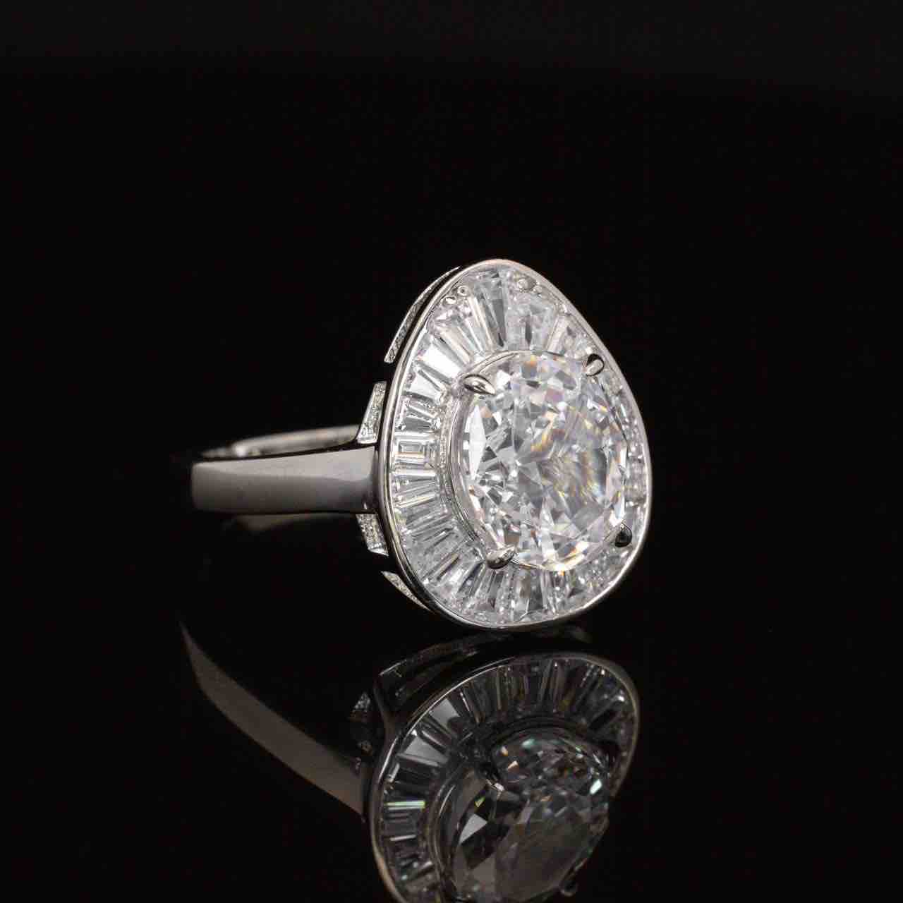Irene White Pear Ring With High Quality Simulated Diamonds in 925 Silver - OMNIASTORES UAE