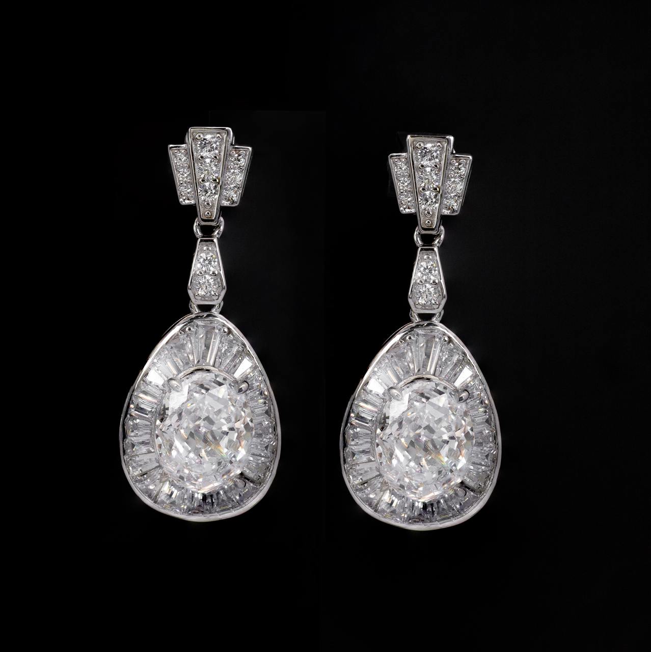 Irene White Pear Drop Earrings With High Quality Simulated Diamonds in 925 Silver - OMNIASTORES UAE