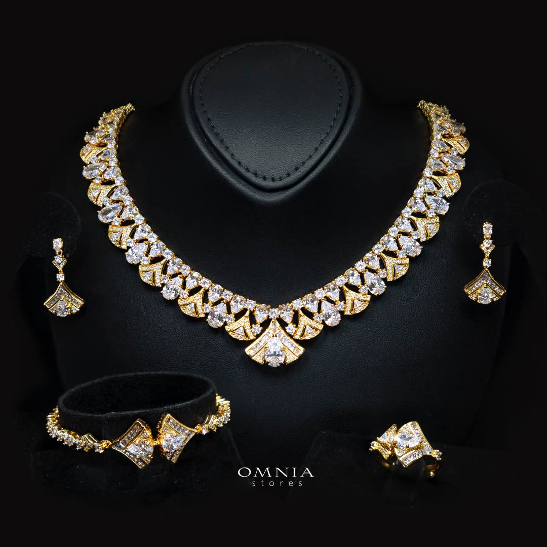 Omnia Elizabeth Golden Bridal Full Set with Pear and Round Cut High-Quality Simulated Diamonds in an Elegant Gold-Tone Rhodium Plated Finish