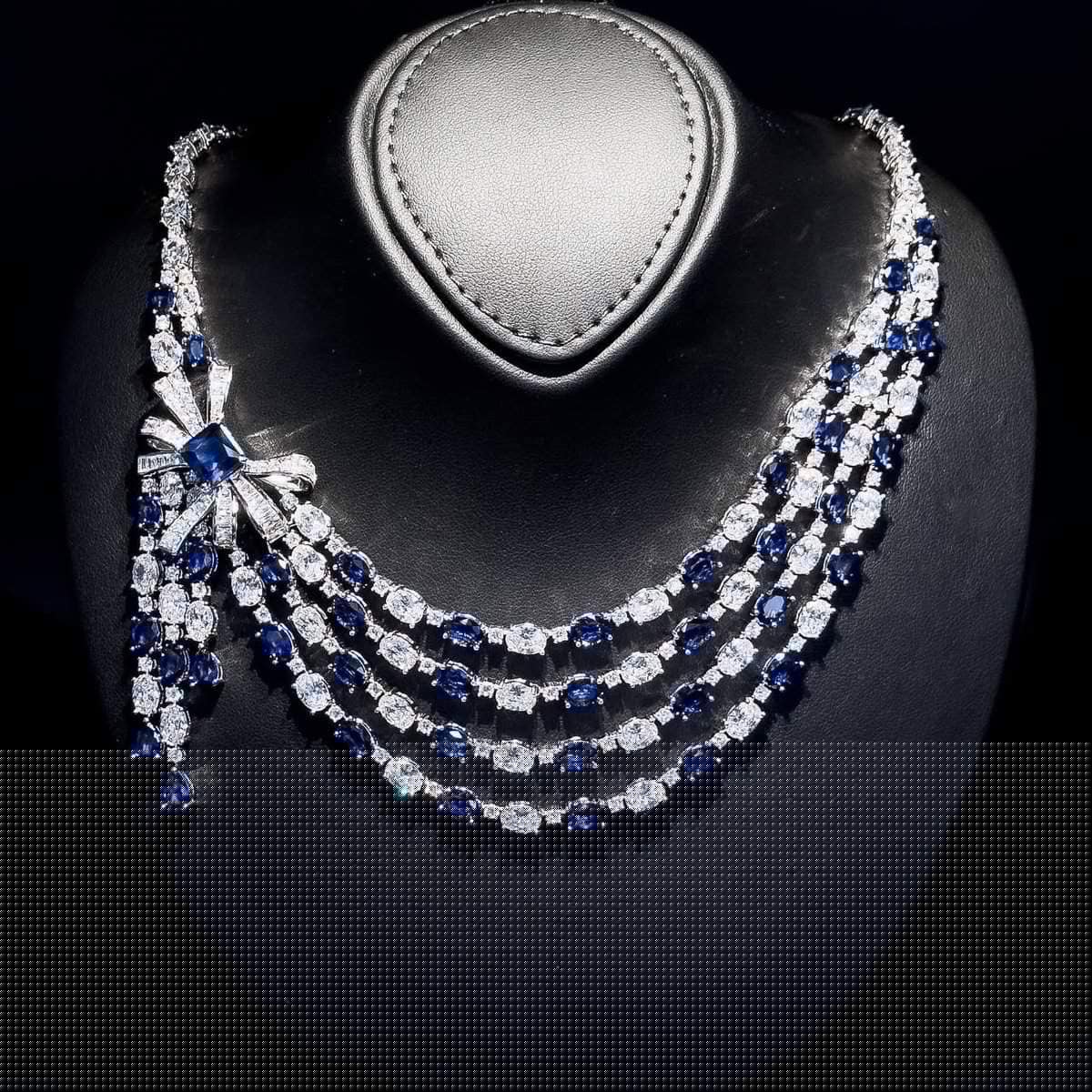 Omnia Mawada Blue Bridal Full Set with Elegant Bow-Accent Design and High-Quality Zircon Stones in Rhodium Plated Finish - OMNIASTORES UAE