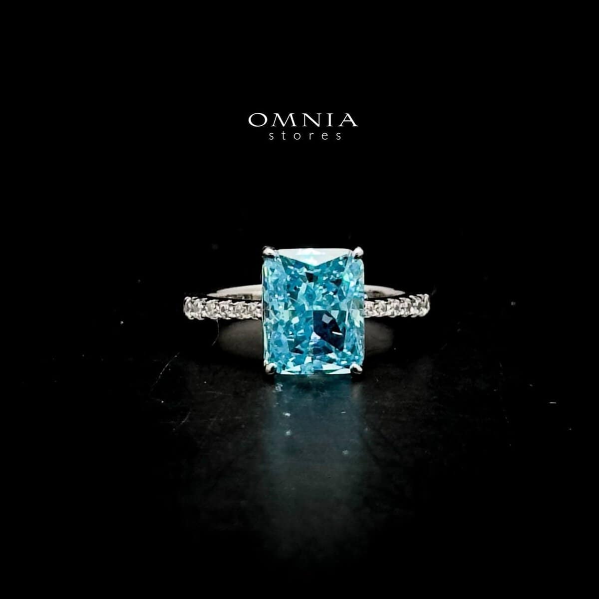 Omnia Alcina Radiant Cut Sky Blue Ring in 92.5 Silver with High Quality Simulated Diamonds - OMNIASTORES UAE