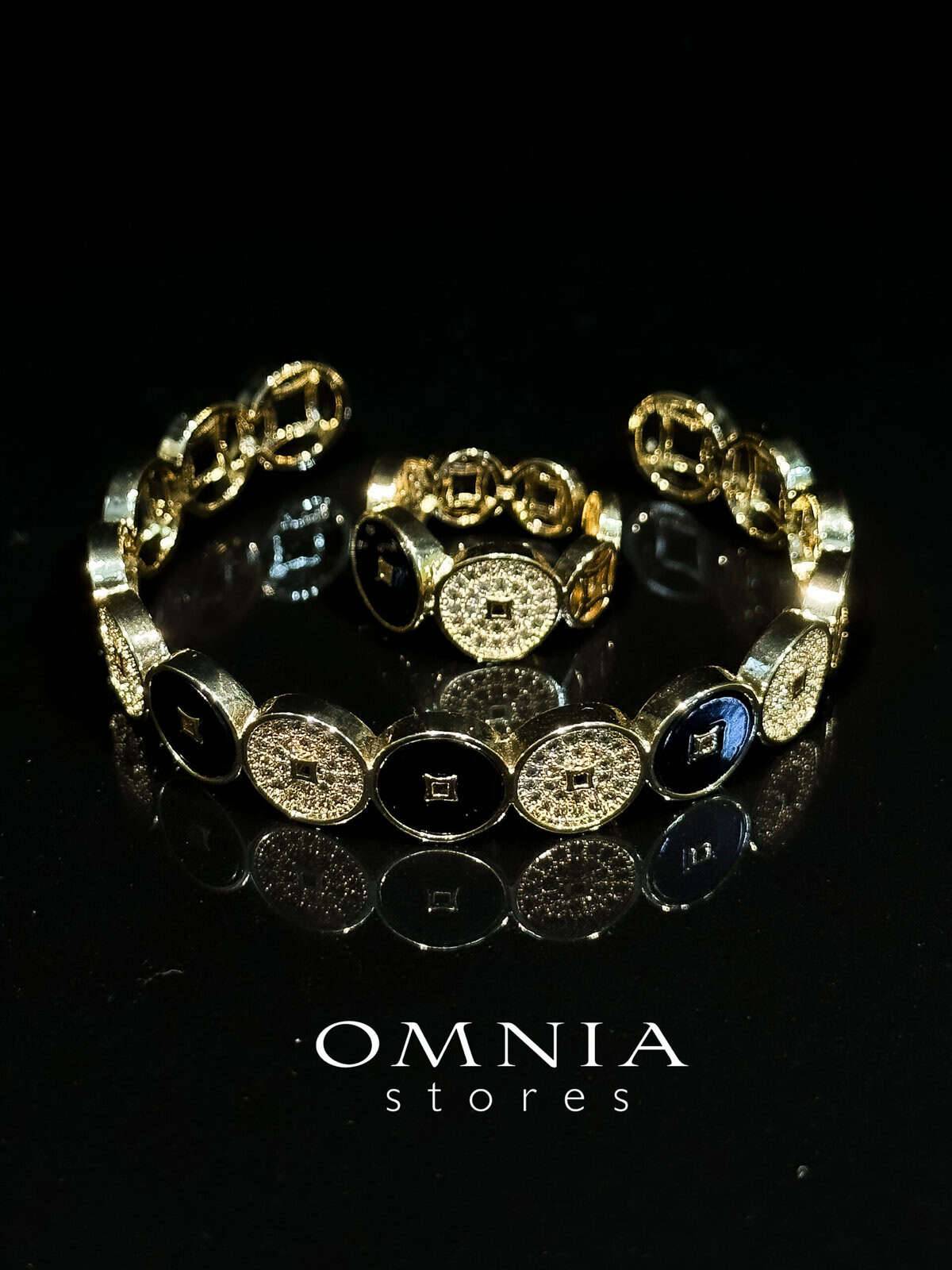 Omnia Golden Cuff With Bracelet and Ring with Black Oval Design In Rhodium Plated - OMNIASTORES UAE