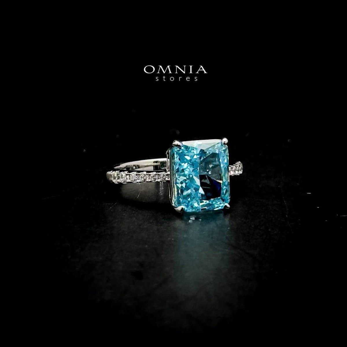 Omnia Alcina Radiant Cut Sky Blue Ring in 92.5 Silver with High Quality Simulated Diamonds - OMNIASTORES UAE