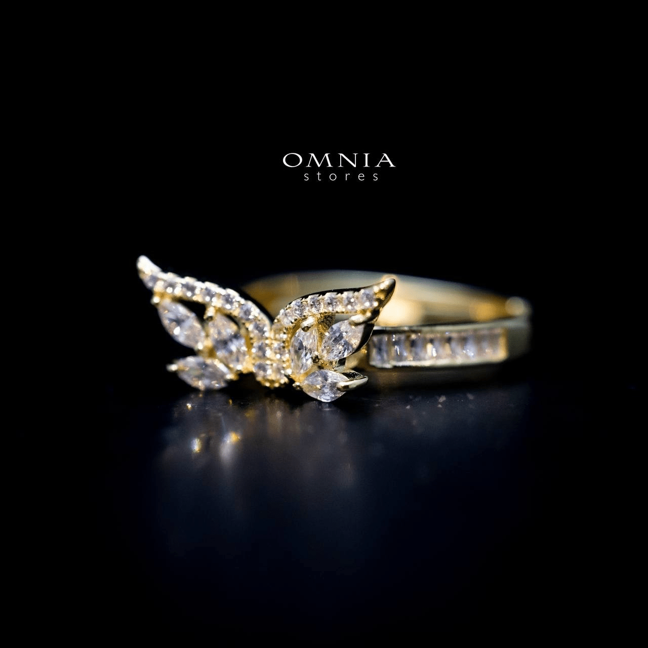 Omnia Malak Winged Charm Ring with High Quality Iced Cut Stone in 92.5 Silver - OMNIASTORES UAE