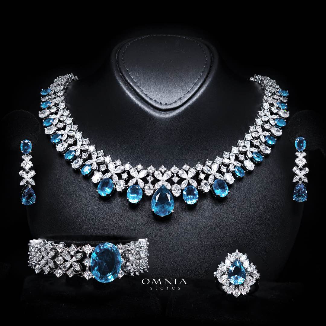 Omnia Suhana Sky Blue Bridal Full Set Designed with Pear-Cut and Round Simulated Diamonds in High-Quality Rhodium Plated Finish