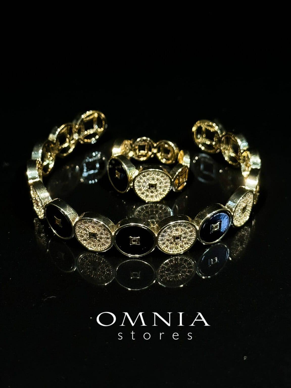 Omnia Golden Cuff With Bracelet and Ring with Black Oval Design In Rhodium Plated - OMNIASTORES UAE