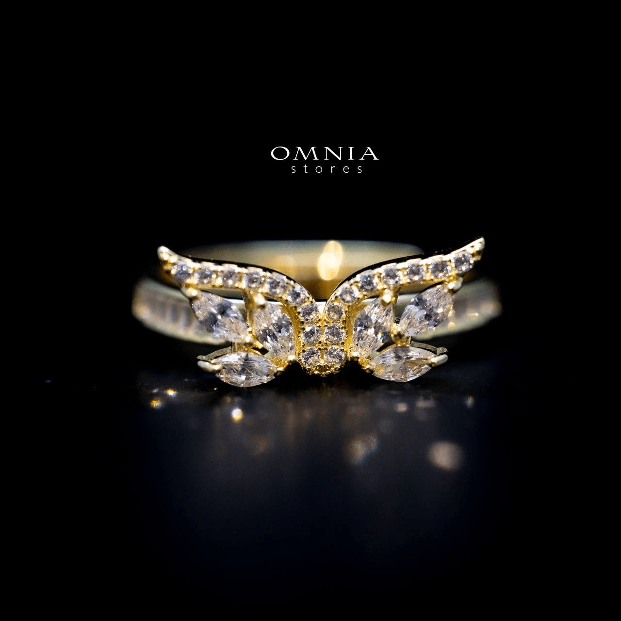 Omnia Malak Winged Charm Ring with High Quality Iced Cut Stone in 92.5 Silver - OMNIASTORES UAE