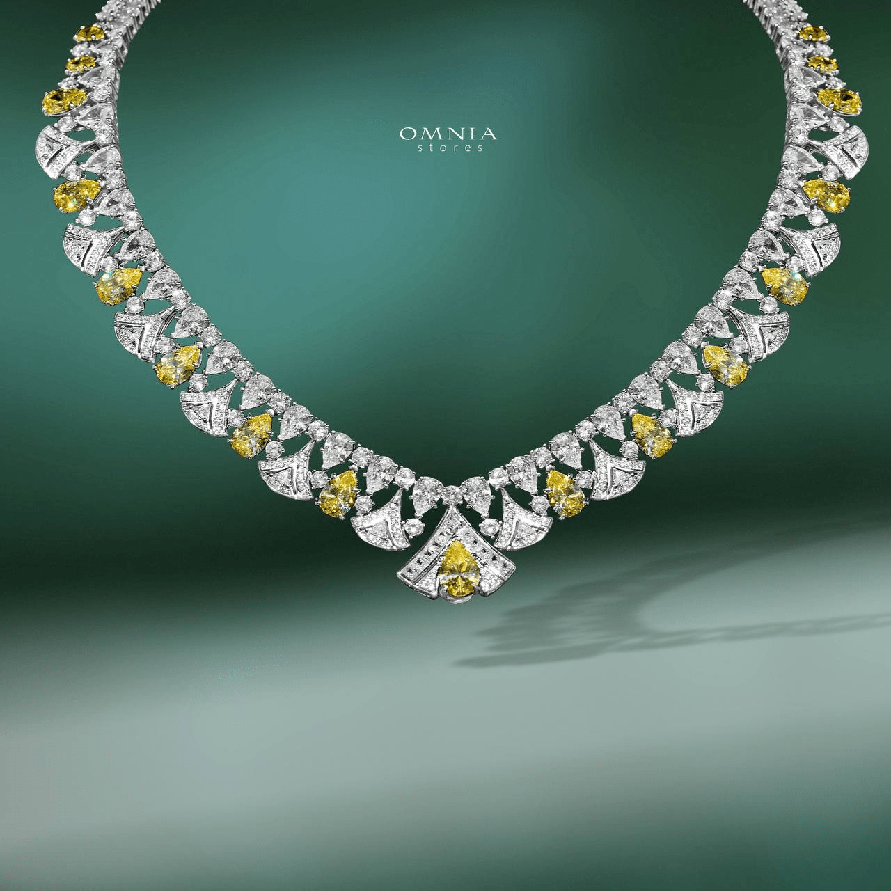 Omnia Elizabeth Yellow & White Bridal Full Set with Pear and Round Cut High-Quality Simulated Diamonds in a Stunning Two-Tone Rhodium Plated Finish - OMNIASTORES UAE