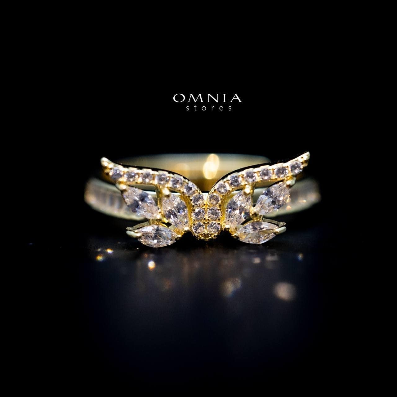 Omnia Malak Winged Charm Ring with High Quality Iced Cut Stone in 92.5 Silver - OMNIASTORES UAE