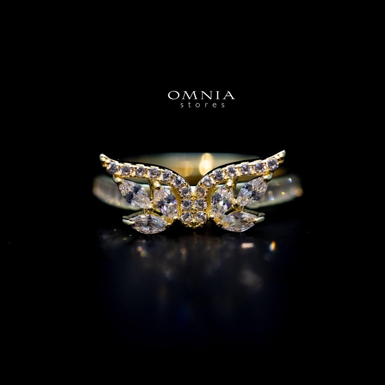 Omnia Malak Winged Charm Ring with High Quality Iced Cut Stone in 92.5 Silver - OMNIASTORES UAE