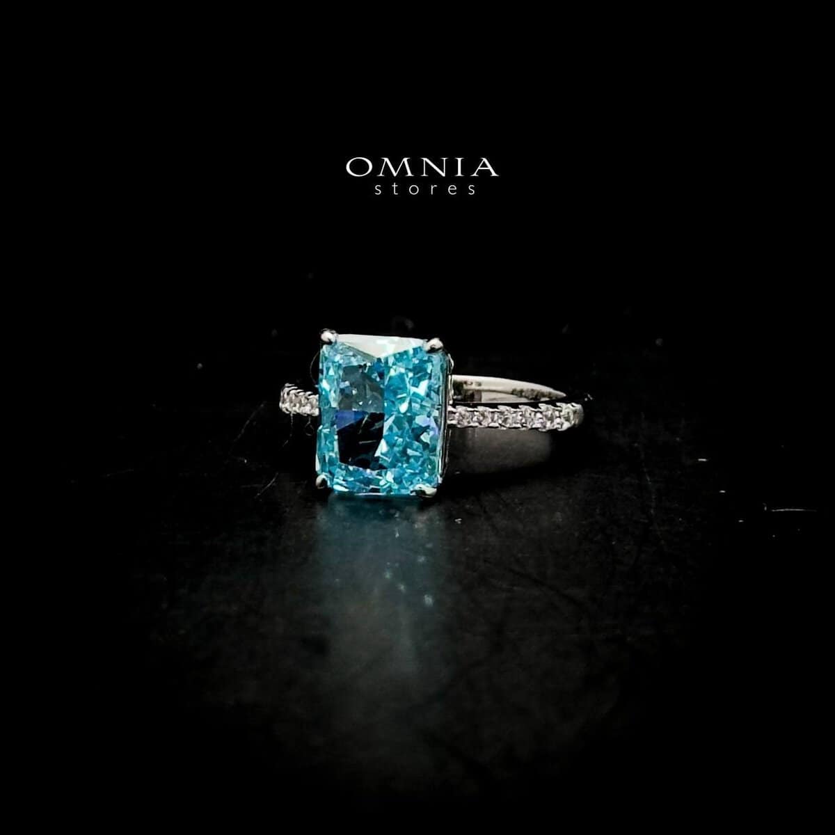 Omnia Alcina Radiant Cut Sky Blue Ring in 92.5 Silver with High Quality Simulated Diamonds - OMNIASTORES UAE