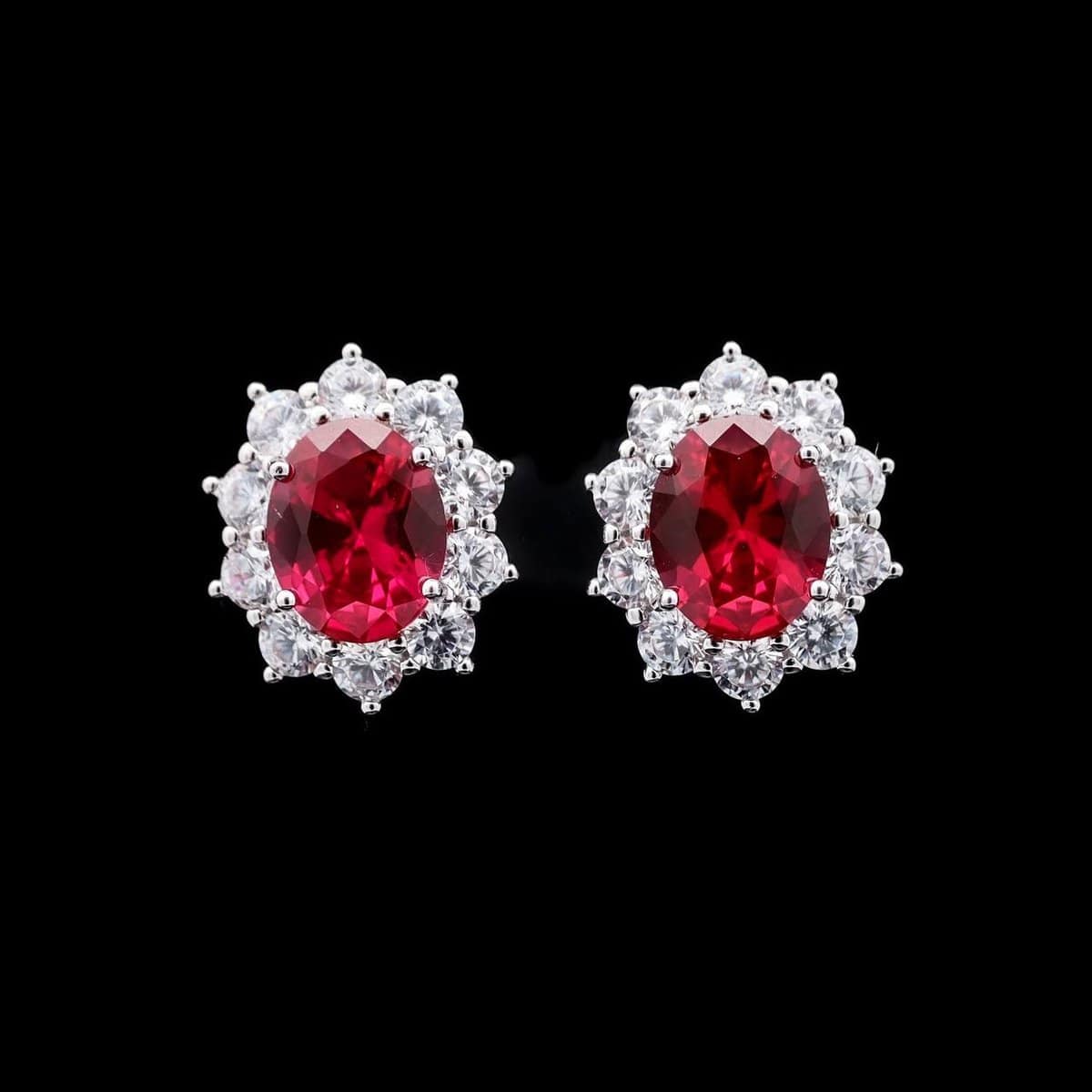 Omnia Elara Ruby Red Oval Stud Earrings in 92.5 Silver with High-Quality Simulated Diamonds - OMNIASTORES UAE