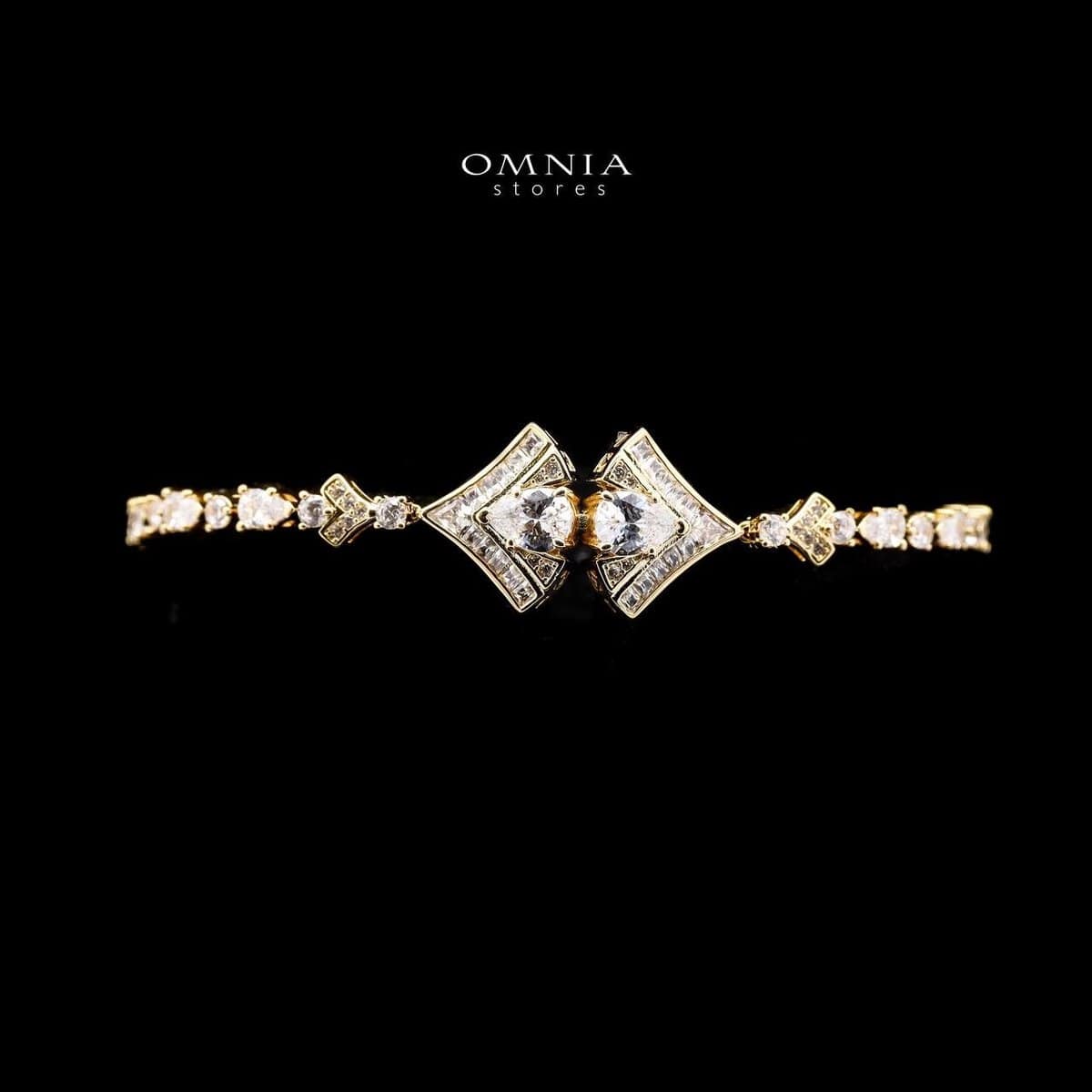 Omnia Elizabeth Golden Bridal Full Set with Pear and Round Cut High-Quality Simulated Diamonds in an Elegant Gold-Tone Rhodium Plated Finish - OMNIASTORES UAE