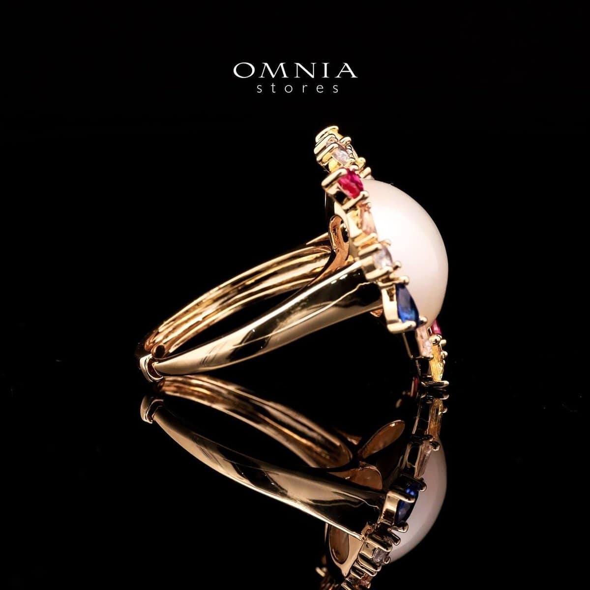 Omnia Serena White Mabel Pearl Halo Ring with Multi-Color Zircon Accents in Brass with Gold Plated Finish - OMNIASTORES UAE