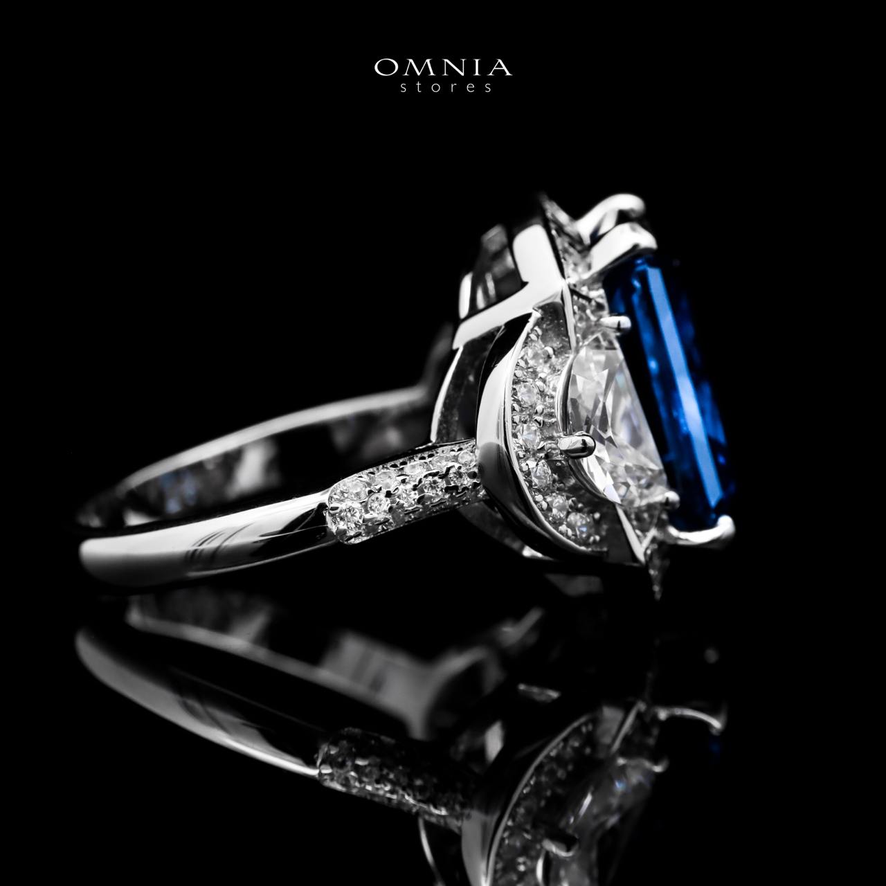 Omnia Sadeen Emerald Cut Sapphire Blue Ring in 92.5 Silver with High Quality Simulated Diamonds - OMNIASTORES UAE