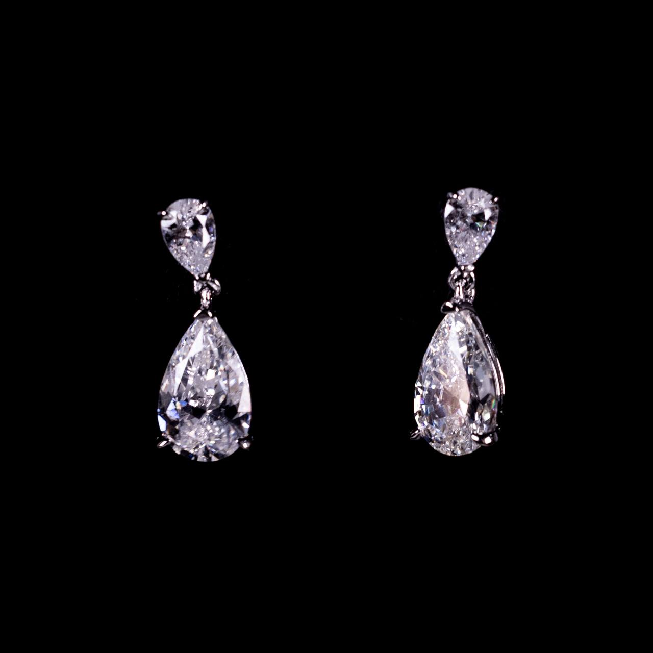 Omnia Rawa White Pear Cut Silver Drop Earrings In 925 Silver High Quality Certified Lab Crafted Stones
