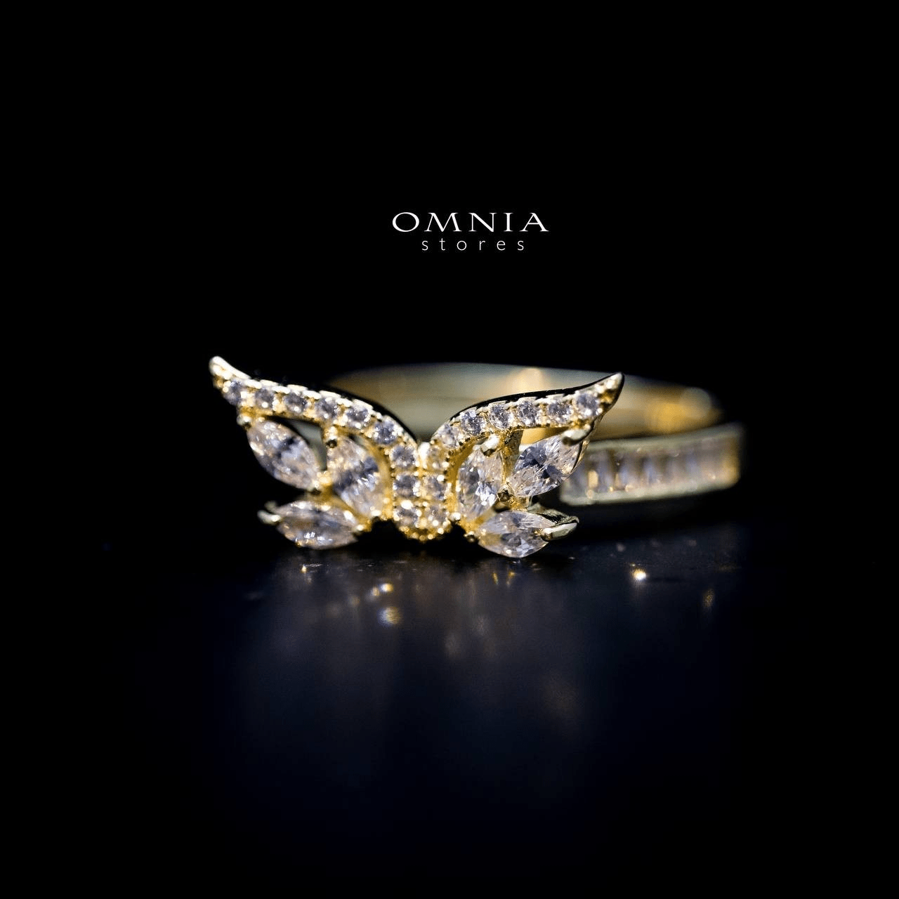 Omnia Malak Winged Charm Ring with High Quality Iced Cut Stone in 92.5 Silver - OMNIASTORES UAE