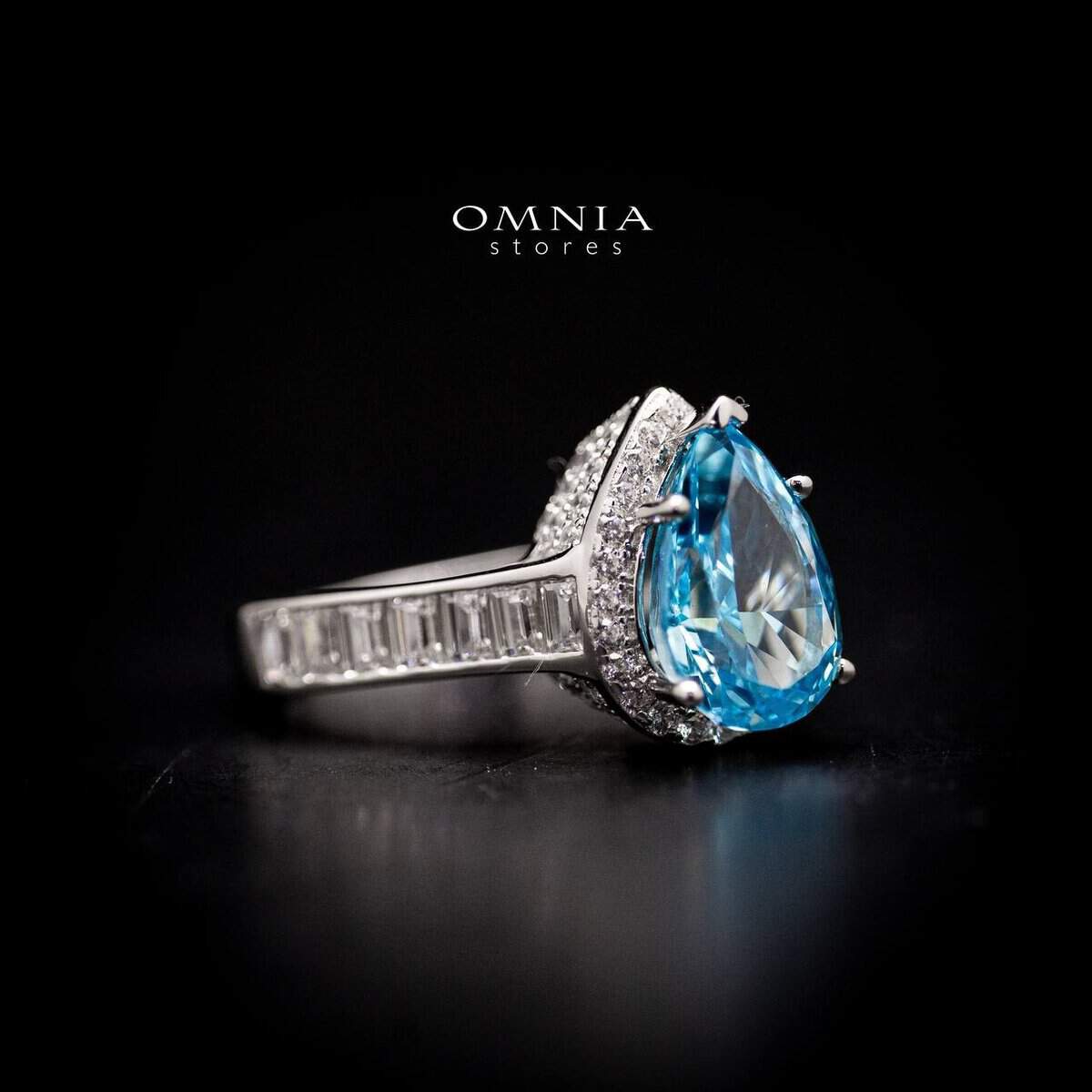 Omnia Layal Pear Shaped Sky Blue Ring in 92.5 Silver with High Quality Simulated Diamonds - OMNIASTORES UAE