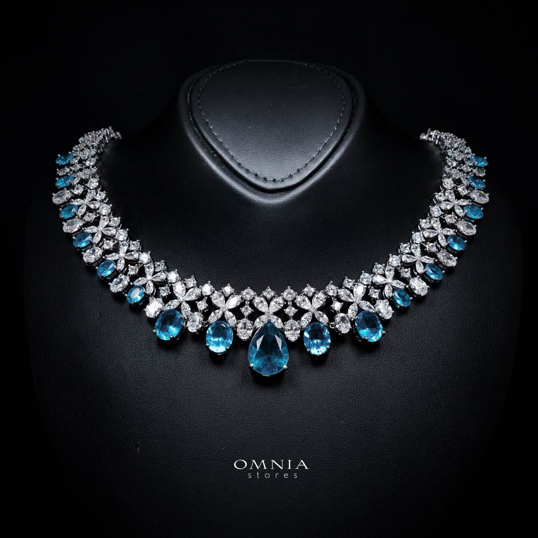Omnia Suhana Sky Blue Bridal Full Set Designed with Pear-Cut and Round Simulated Diamonds in High-Quality Rhodium Plated Finish