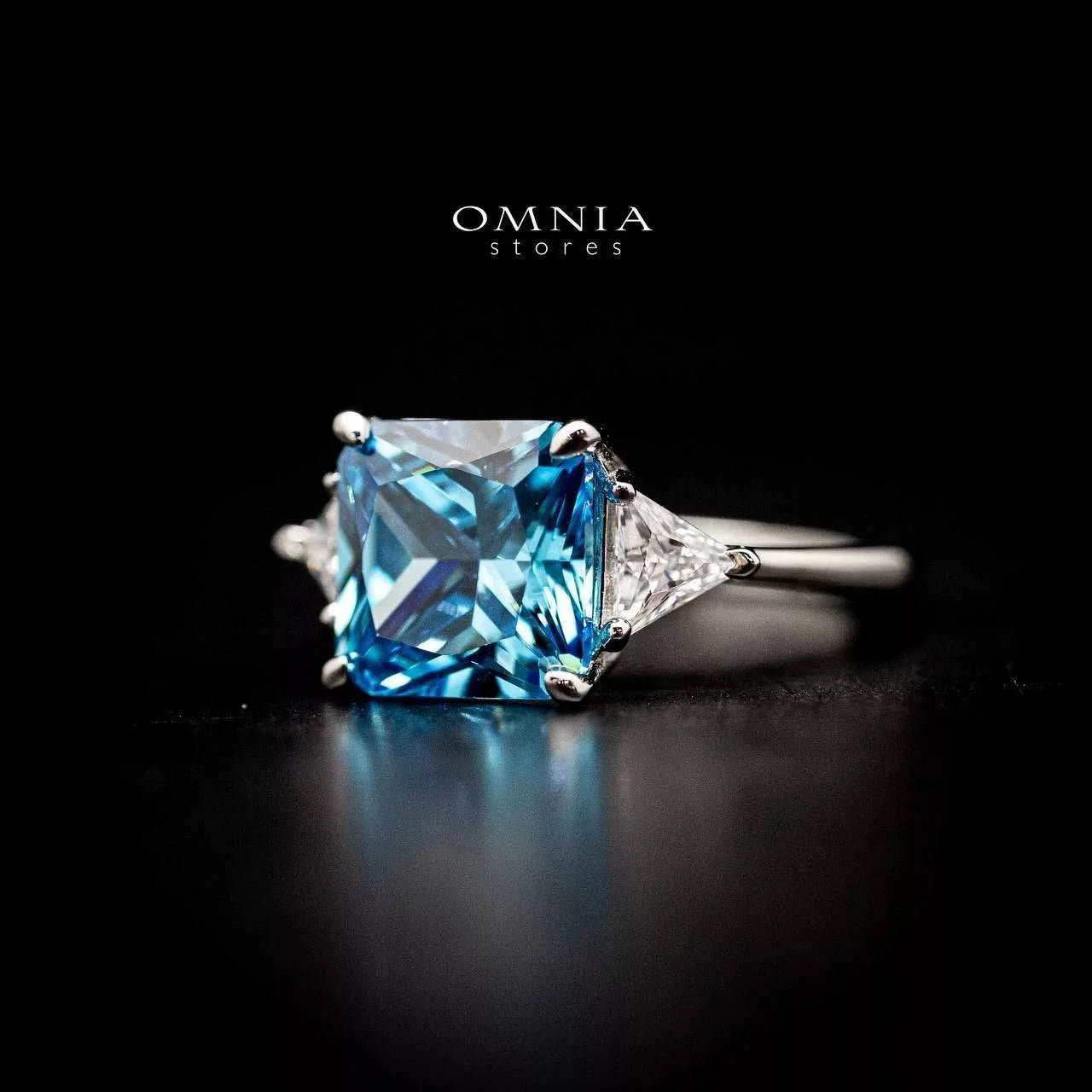 Omnia Manal Princess Cut Sky Blue Ring in 92.5 Silver with High Quality Simulated Diamonds - OMNIASTORES UAE