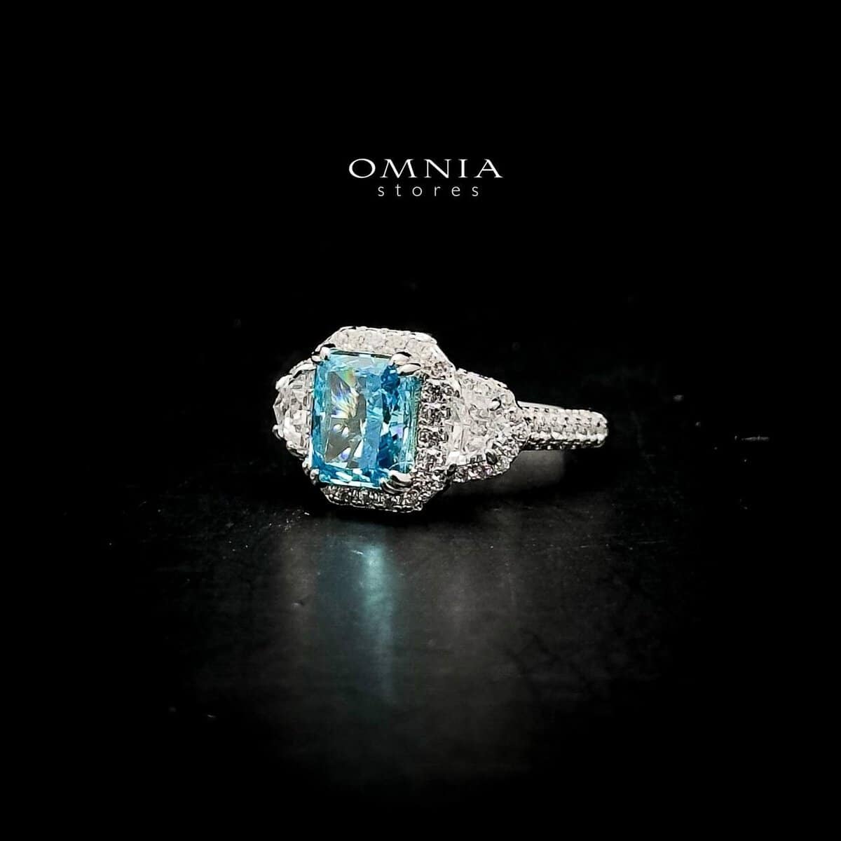 Omnia Aseel Radiant Cut Sky Blue Ring in 92.5 Silver with High Quality Simulated Diamonds - OMNIASTORES UAE