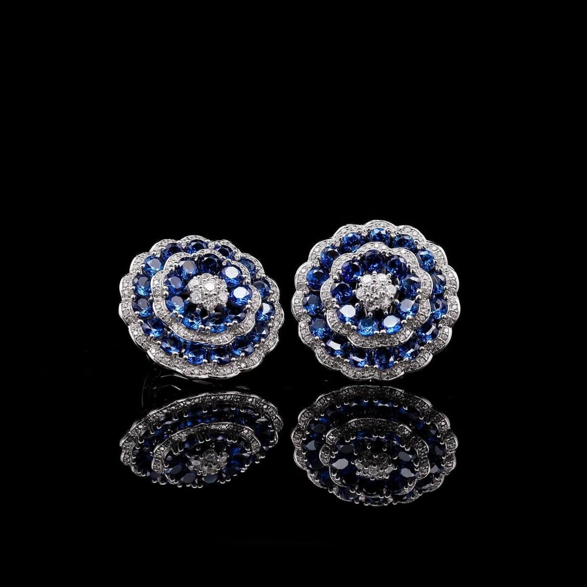 Omnia Floral Halo Earrings with Sapphire Blue Simulated Diamonds in 92.5 Silver - OMNIASTORES UAE