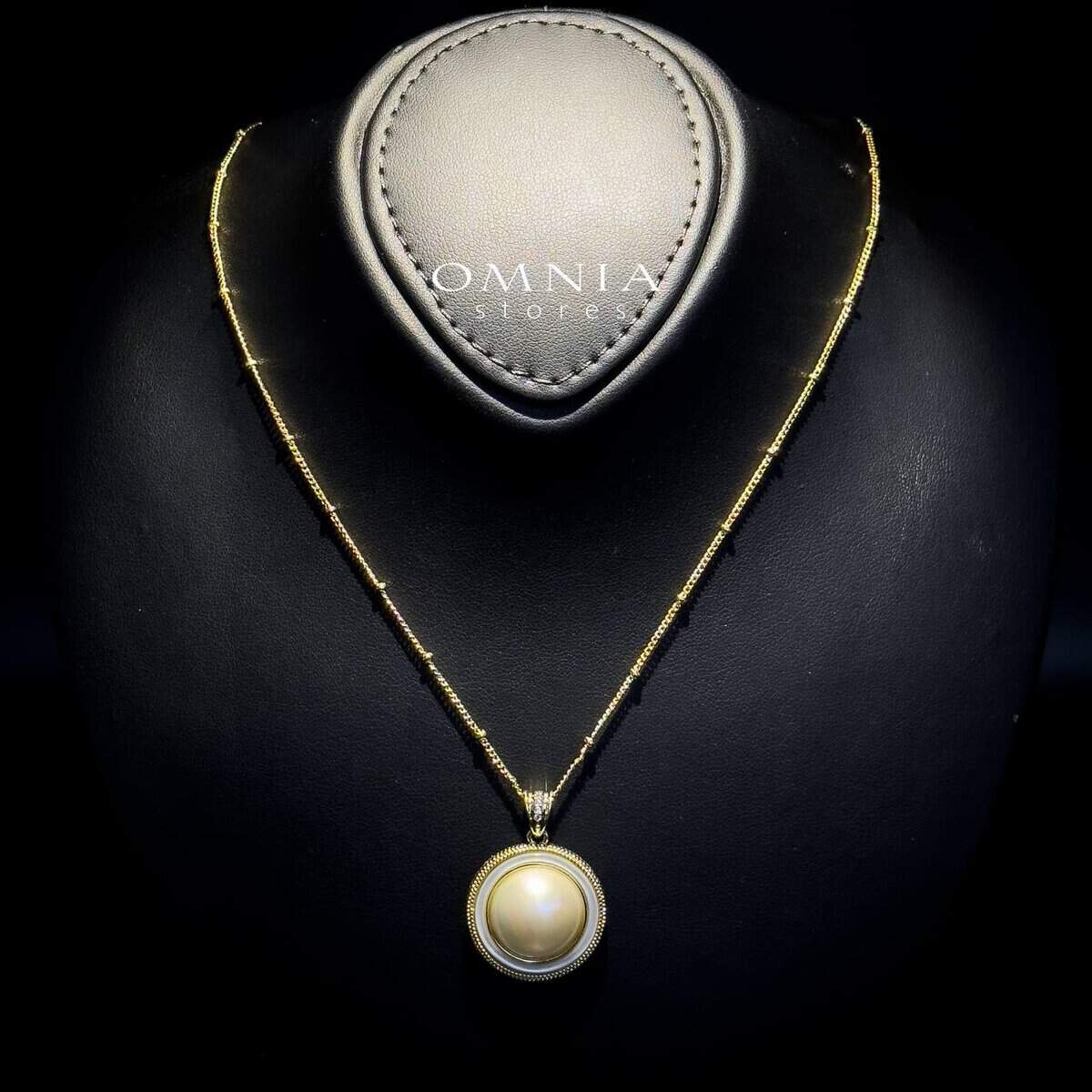 Omnia Leona White Mabel Pearl Classic Pendant Necklace with Textured Beaded Frame in Brass with Gold Plated Finish - OMNIASTORES UAE