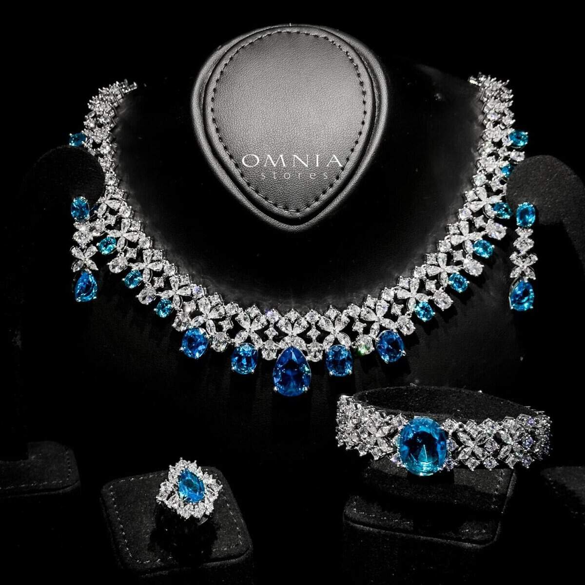 Omnia Suhana Sky Blue Bridal Full Set Designed with Pear-Cut and Round Simulated Diamonds in High-Quality Rhodium Plated Finish - OMNIASTORES UAE