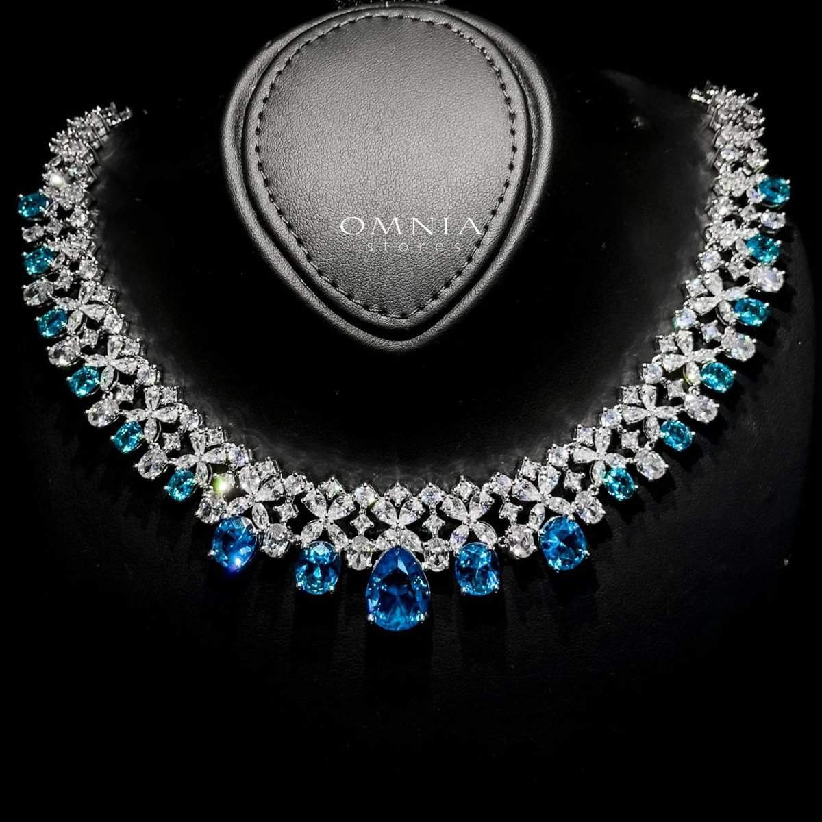 Omnia Suhana Sky Blue Bridal Full Set Designed with Pear-Cut and Round Simulated Diamonds in High-Quality Rhodium Plated Finish - OMNIASTORES UAE