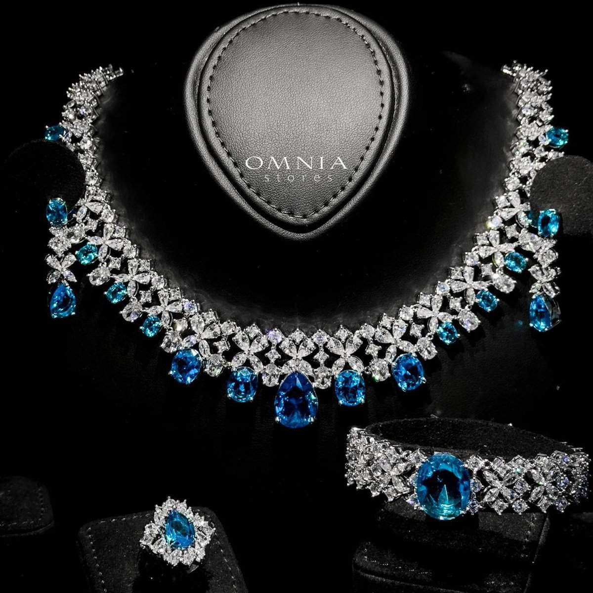 Omnia Suhana Sky Blue Bridal Full Set Designed with Pear-Cut and Round Simulated Diamonds in High-Quality Rhodium Plated Finish - OMNIASTORES UAE
