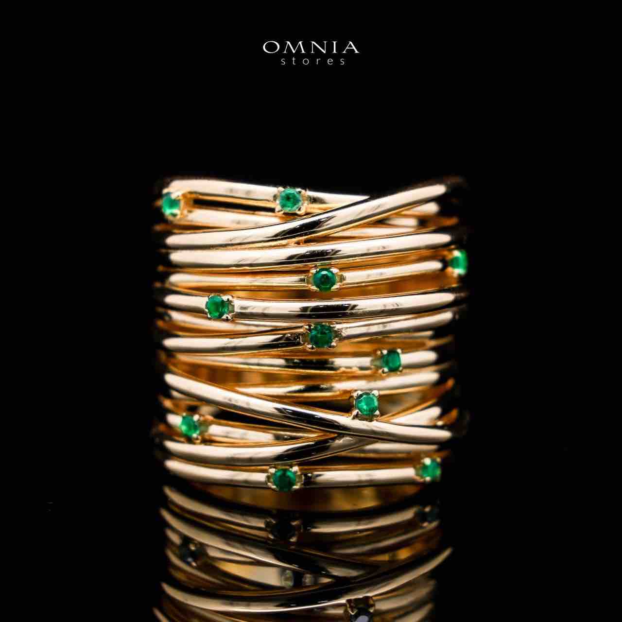 Omnia Dhuriyyah Golden Spiral Ring in 925 Silver with High-Quality Green Simulated Diamonds - OMNIASTORES UAE