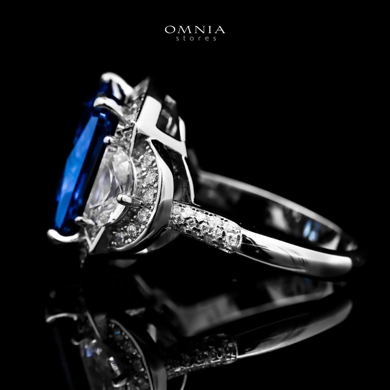 Omnia Sadeen Emerald Cut Sapphire Blue Ring in 92.5 Silver with High Quality Simulated Diamonds - OMNIASTORES UAE