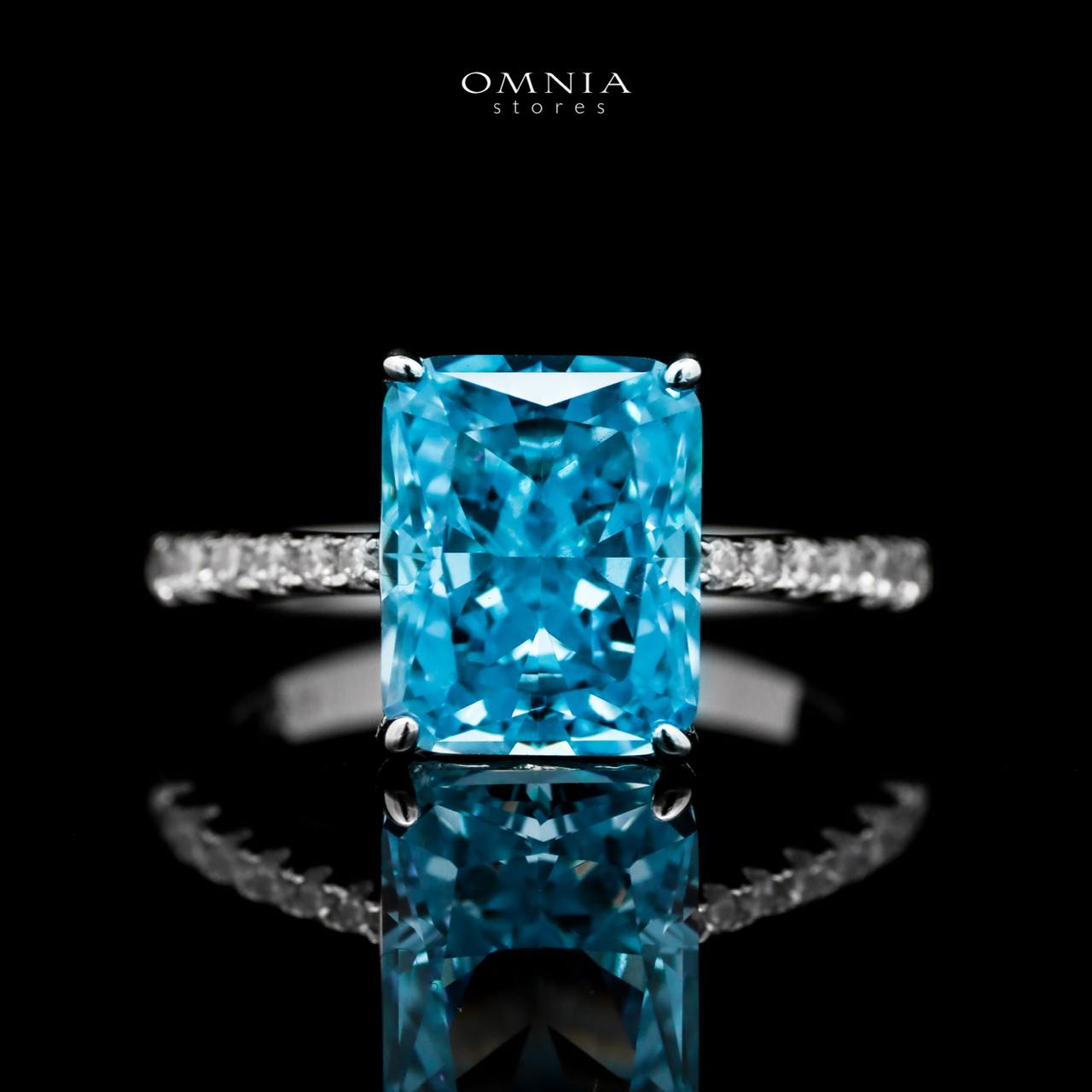 Omnia Alcina Radiant Cut Sky Blue Ring in 92.5 Silver with High Quality Simulated Diamonds - OMNIASTORES UAE